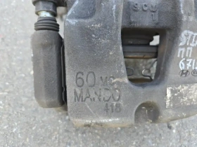 Суппорт тормозной Kia Stinger J5 2017- Перед. Прав.