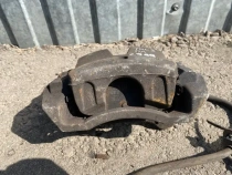 Суппорт тормозной Hyundai Tucson TL 2015-2021 Перед. Лев.