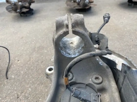 Кулак поворотный Kia Stinger J5 2017- Перед. Лев.