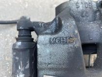 Суппорт тормозной Kia Sportage QL 2015-2022 Перед. Лев.