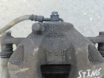 Суппорт тормозной Kia Stinger J5 2017- Перед. Лев.