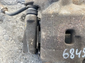 Суппорт тормозной Infiniti Q50 V37 2013- Перед. Прав.