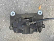 Суппорт тормозной Mitsubishi Outlander 3 GF 2012-2023 Перед. Лев.