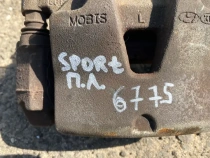 Суппорт тормозной Kia Sportage QL 2015-2022 Перед. Лев.