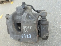 Суппорт тормозной Kia Sportage QL 2015-2022 Перед. Лев.