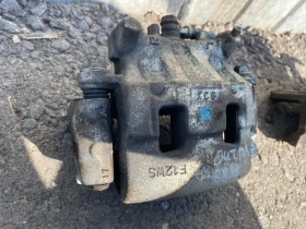 Суппорт тормозной Mitsubishi Outlander 3 GF 2012-2023 Перед. Лев.