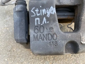 Суппорт тормозной Kia Stinger J5 2017- Перед. Лев.