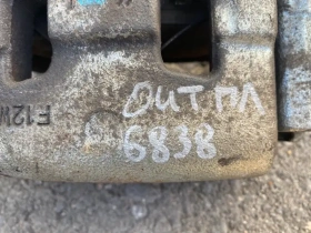 Суппорт тормозной Mitsubishi Outlander 3 GF 2012-2023 Перед. Лев.