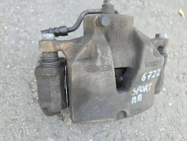 Суппорт тормозной Kia Sportage QL 2015-2022 Перед. Прав.