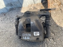 Суппорт тормозной Toyota Corolla E210 E210 2018- Перед. Лев.