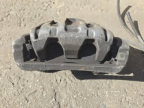 Суппорт тормозной Honda CRV 5 RW 2016- Перед. Лев.