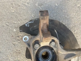 Кулак поворотный Mitsubishi Outlander 3 GF 2012-2023 Перед. Лев.