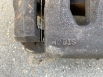 Суппорт тормозной Kia Sorento Prime UM 2014-2020 Перед. Лев.