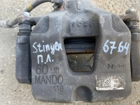 Суппорт тормозной Kia Stinger J5 2017- Перед. Лев.