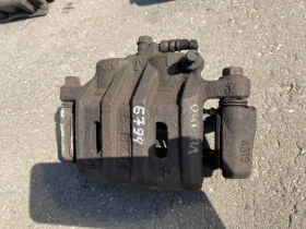 Суппорт тормозной Mitsubishi Outlander 3 GF 2012-2023 Перед. Лев.