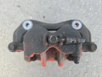 Суппорт тормозной Kia Sorento Prime UM 2014-2020 Перед. Лев.