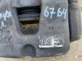 Суппорт тормозной Kia Stinger J5 2017- Перед. Лев.