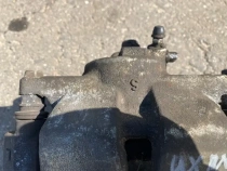 Суппорт тормозной Lexus UX MZAA10L MZAH10L 2018- Перед. Лев.