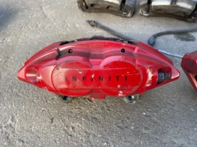 Суппорт тормозной Infiniti Q50 V37 2013- Перед. 