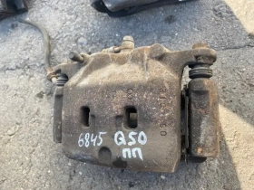 Суппорт тормозной Infiniti Q50 V37 2013- Перед. Прав.