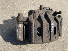 Суппорт тормозной Mitsubishi Outlander 3 GF 2012-2023 Перед. Лев.