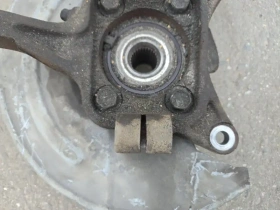 Кулак поворотный Mitsubishi Outlander 3 GF 2012-2023 Перед. Лев.