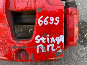 Суппорт тормозной Kia Stinger J5 2017- Перед. 