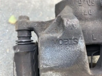 Суппорт тормозной Hyundai Tucson TL 2015-2021 Перед. Лев.