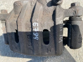 Суппорт тормозной Mitsubishi Outlander 3 GF 2012-2023 Перед. Лев.