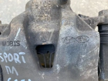 Суппорт тормозной Kia Sportage QL 2015-2022 Перед. Лев.