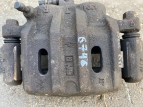 Суппорт тормозной Mitsubishi Outlander 3 GF 2012-2023 Перед. Прав.