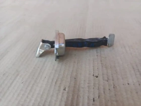 Ограничитель двери Mitsubishi Outlander 3 GF 2012-2023 Задн. Лев.