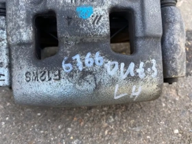 Суппорт тормозной Mitsubishi Outlander 3 GF 2012-2023 Перед. Лев.
