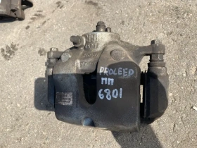 Суппорт тормозной Kia Proceed CD 2018- Перед. Прав.