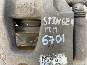 Суппорт тормозной Kia Stinger J5 2017- Перед. 