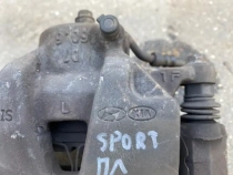 Суппорт тормозной Kia Sportage QL 2015-2022 Перед. Лев.