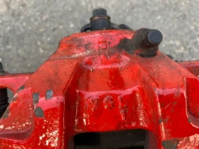 Суппорт тормозной Kia Stinger J5 2017- Перед. 