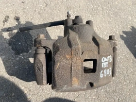 Суппорт тормозной Mitsubishi Outlander 3 GF 2012-2023 Перед. Прав.