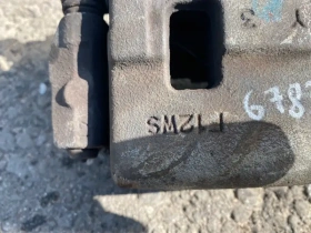 Суппорт тормозной Mitsubishi Outlander 3 GF 2012-2023 Перед. Лев.