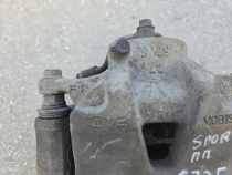 Суппорт тормозной Kia Sportage QL 2015-2022 Перед. Прав.