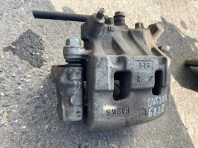 Суппорт тормозной Mitsubishi Outlander 3 GF 2012-2023 Перед. Прав.