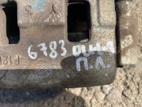 Суппорт тормозной Mitsubishi Outlander 3 GF 2012-2023 Перед. Лев.