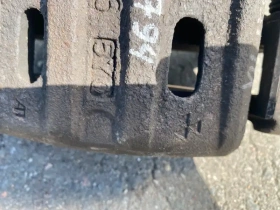 Суппорт тормозной Mitsubishi Outlander 3 GF 2012-2023 Перед. Лев.