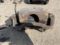 Суппорт тормозной Kia Sportage QL 2015-2022 Перед. Прав.