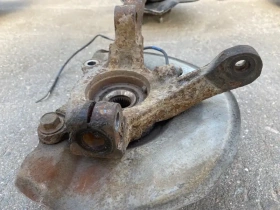 Кулак поворотный Mitsubishi Outlander 3 GF 2012-2023 Перед. Прав.