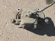 Суппорт тормозной Hyundai Tucson TL 2015-2021 Перед. Лев.