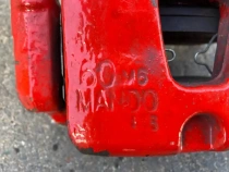 Суппорт тормозной Kia Stinger J5 2017- Перед. 