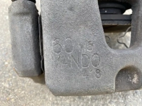 Суппорт тормозной Kia Stinger J5 2017- Перед. 