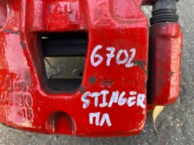 Суппорт тормозной Kia Stinger J5 2017- Перед. 