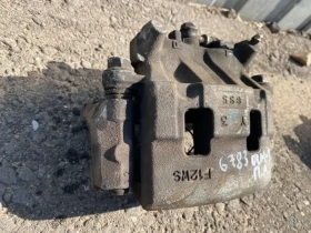 Суппорт тормозной Mitsubishi Outlander 3 GF 2012-2023 Перед. Лев.